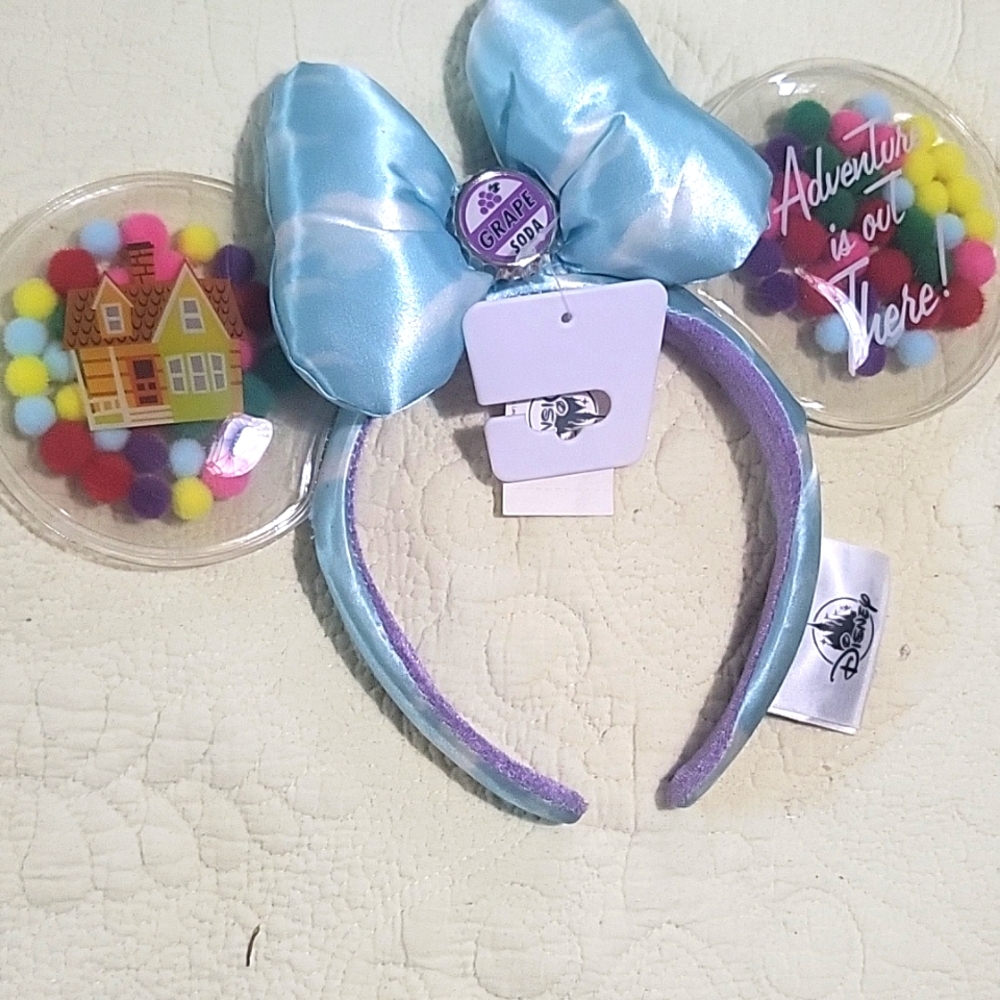 Youth little girls Disney Mickey mouse ears with a little grape soda cap on them
